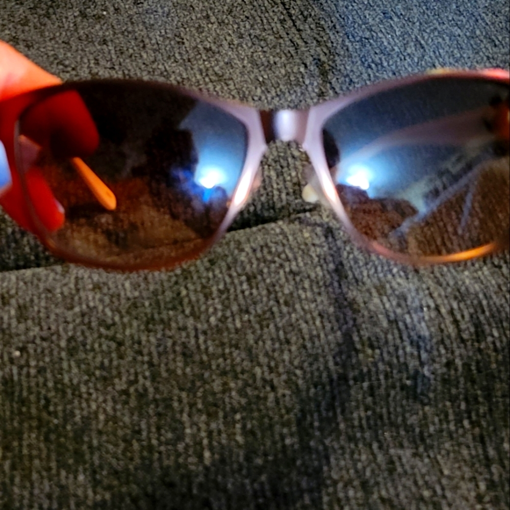 Sunglasses with matching case and cleaning cloth